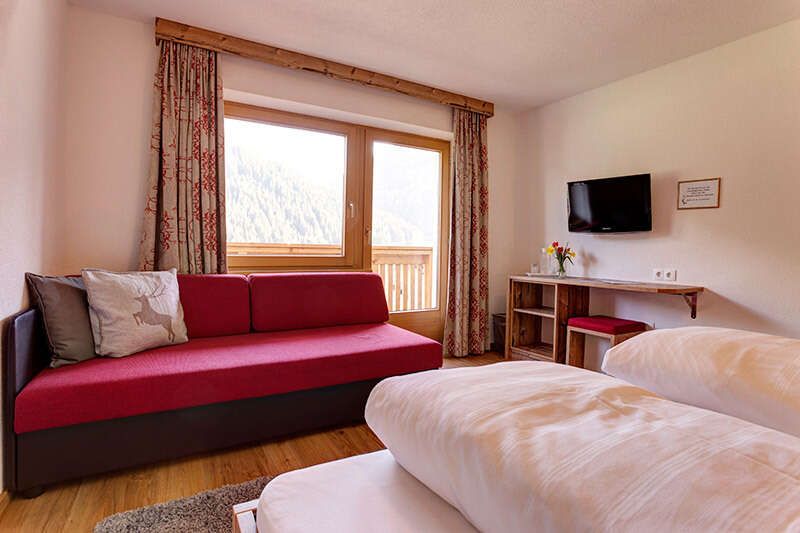 Doppel- bzw Dreibettzimmer in Pension Roman am Arlberg